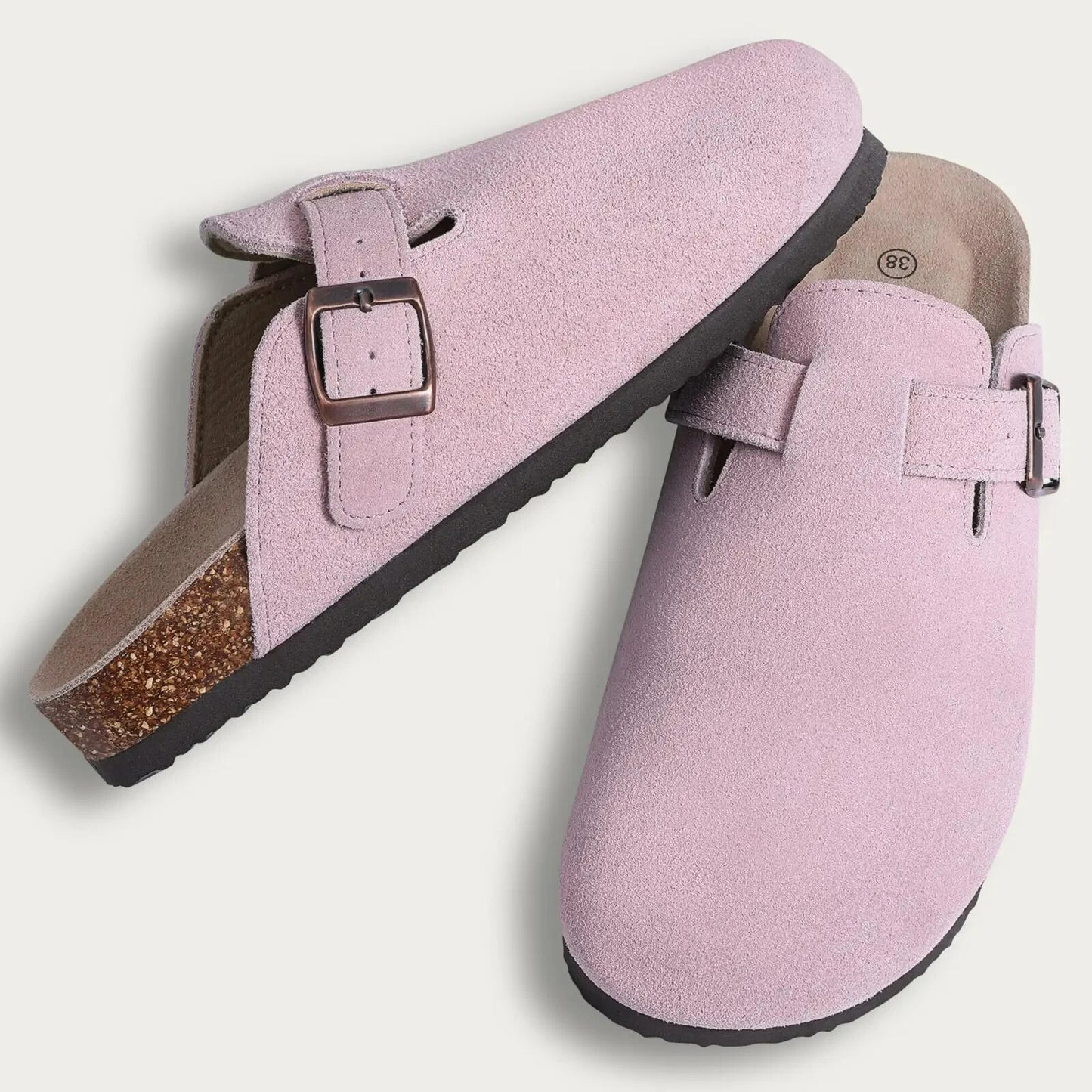 Pink Bali Clogs in premium suede with a comfortable cork sole, offering a warm and stylish look for everyday wear.